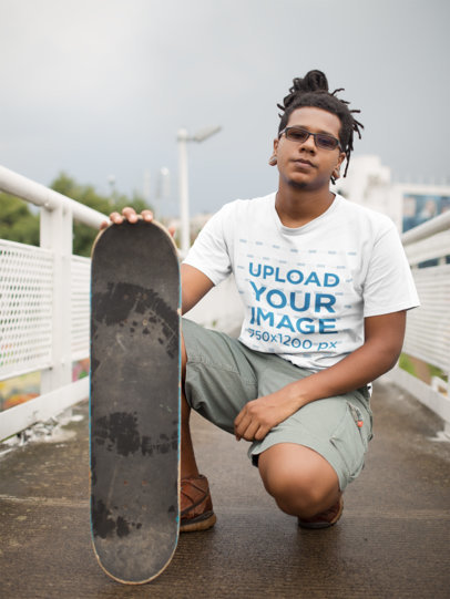 T-Shirt Mockup of a Man with Locks Wearing Ear Expander Earrings