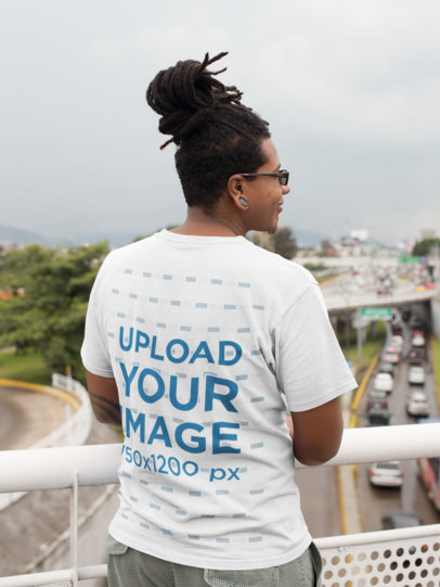 Back View of a T-Shirt Mockup Featuring a Man with Locs