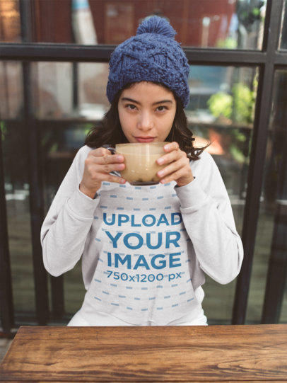 Crewneck Sweatshirt Mockup of a Woman Having a Latte