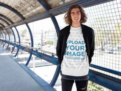 Sweatshirt Mockup of a Man on a Pedestrian Bridge 