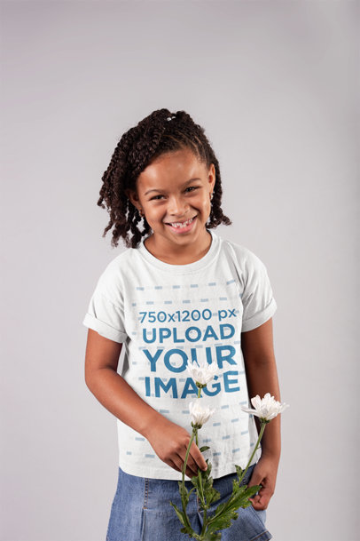 Round Neck T-Shirt Mockup of a Happy Girl with Braids Holding a Flower