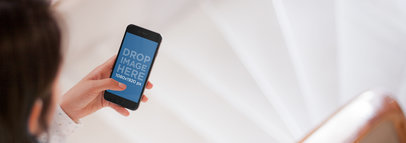 iPhone 6 Mockup of a Young Woman on a Staircase