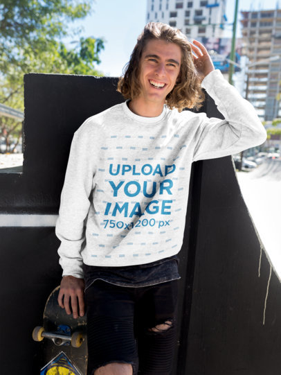 Mockup of a Smiling Man Wearing a Sweatshirt at a Skatepark