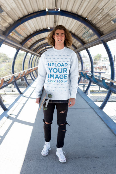 Mockup of a Smiling Skater Wearing a Crewneck Sweater in a Tunnel