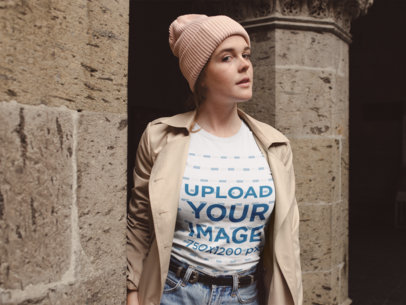 Round Neck T-Shirt Mockup of a Woman Outside a Stone Church