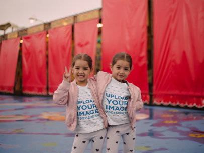 Mockup of Twin Sisters Wearing T-Shirts Posing