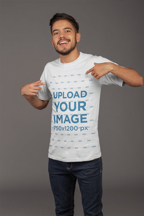 Mockup of a Happy Customer Pointing at His eSports T-Shirt