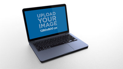 Mockup of a Space Gray MacBook Standing on a Solid Color Surface