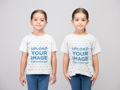 T-Shirt Mockup of Twin Girls at a Photo Studio