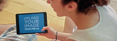 Tablet Mockup of a Young Couple Using an iPad