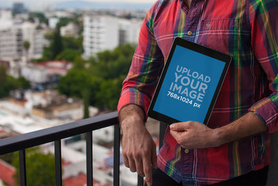 iPad Mockup Held by a Man Wearing a Checkered Shirt 22617