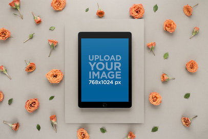 iPad Mockup Set in a Studio Surrounded by Roses