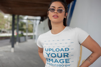 Tshirt Mockup of a Woman Posing by the Street