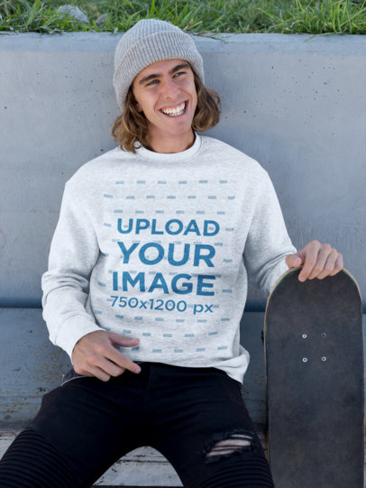 Sweater Mockup of a Man Holding His Skateboard and Smiling