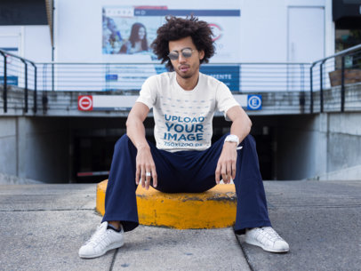 Mockup of a Trendy Man Sitting Outside a Tunnel 22257