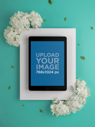 Space Gray iPad Mockup on Cardboard Paper with White Flowers 22710