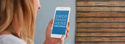 Woman Holding White iPhone 6 Plus Mockup