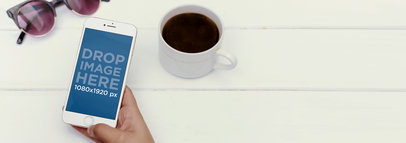 iPhone 7+ Mockup of a Woman Using her iPhone at a Café