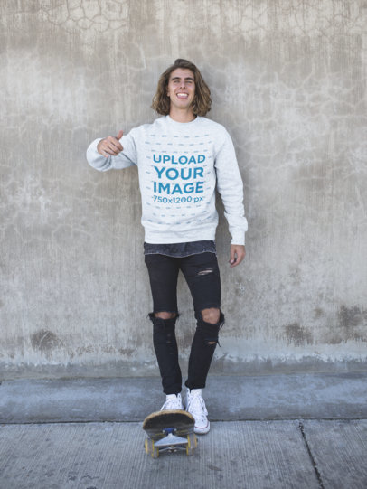 Sweater Mockup of a Smiling Skater Man Wearing Ripped Jeans