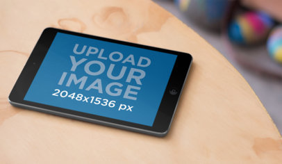 Tablet Mockup of an iPad Mini at a Local Store a3132