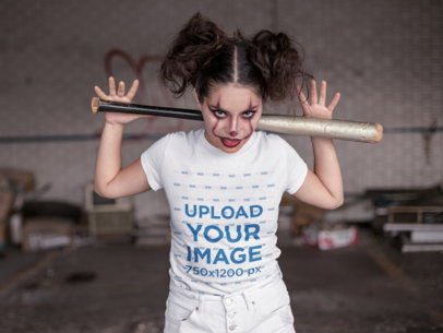 T-Shirt Mockup of a Woman with Halloween Makeup and a Baseball Bat on her Back
