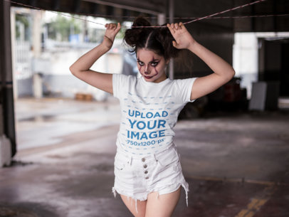 Halloween Makeup T-Shirt Mockup of a Woman Holding a Laundry Rope