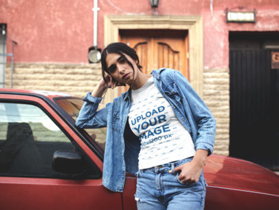 T Shirt Mockup of a Woman in Denim Outfit Leaning Against a Car