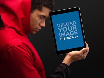 iPad Mockup Being Held by a Man in Front of his Face 22638
