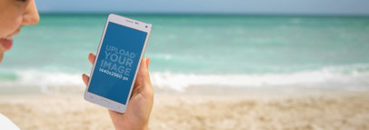 Android Mockup Featuring a Young Lady at the Beach