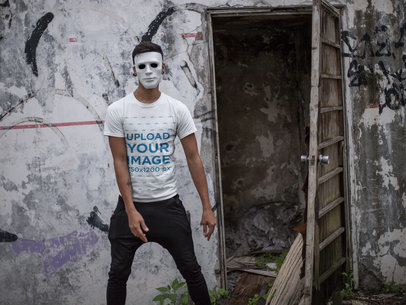 Crewneck Tee Mockup of a Man with a Mask Outside a Haunted House 22945