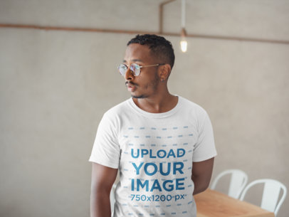 Mockup of a Man with Sideburns and Glasses in his House
