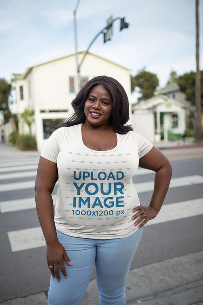 Plus Size T-Shirt Mockup Featuring a Woman on a Venice Beach Street
