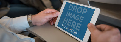 iPad Mockup Featuring a Businessman on a Plane a3200