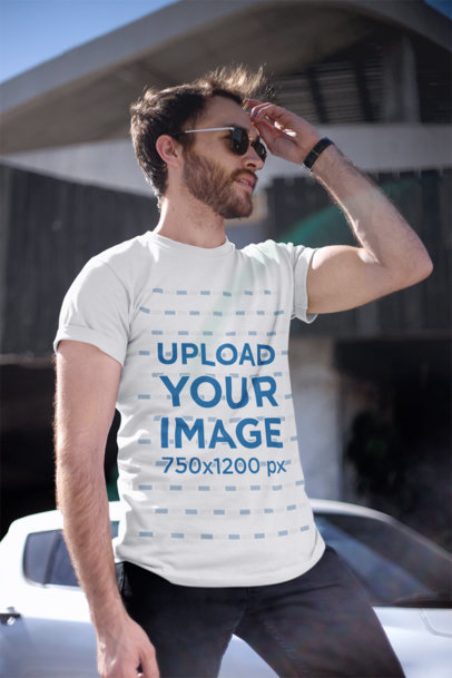 T-Shirt Mockup of a Handsome Man Wearing Sunglasses