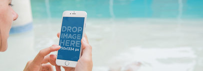 iPhone 6 Mockup Featuring a Woman Using her iPhone at the Pool