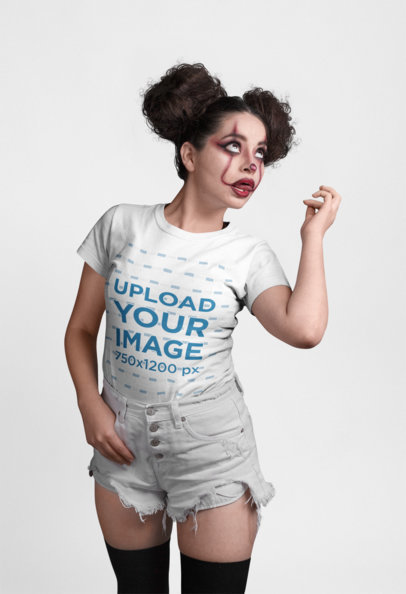 Halloween Mockup of a Woman Wearing a T-Shirt and Scary Clown Makeup Making Faces