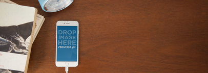 Charging iPhone 6 Mockup Lying on Top of a Nightstand a3850
