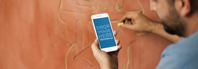 iPhone 6 Mockup of a Young Sculptor at Work