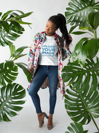 T-Shirt Mockup of a Trendy Woman Wearing Silver Heels and Posing  18370