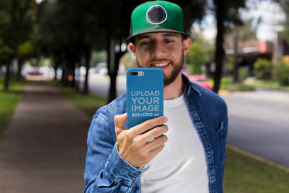 iPhone Case Mockup of a Man Taking a Photo at the Park
