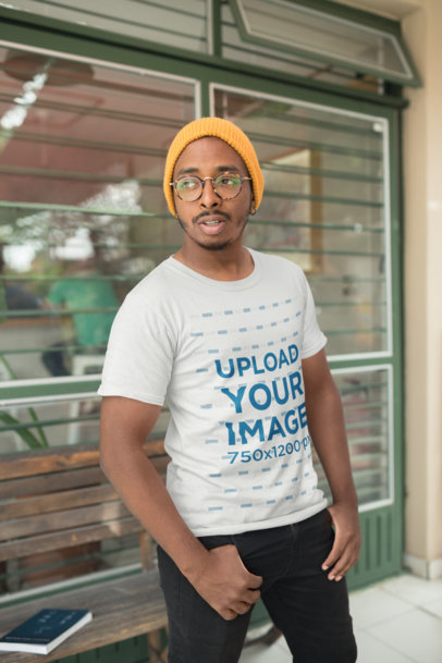 T-Shirt Mockup Featuring a Man Staring out into the Distance 21046