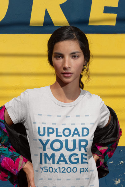 Round Neck Tee Mockup of a Woman Against a Blue and Yellow Background