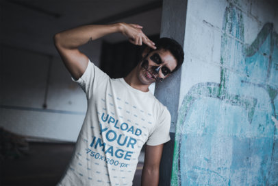 T-Shirt Mockup of a Man with His Fingers to His Temple