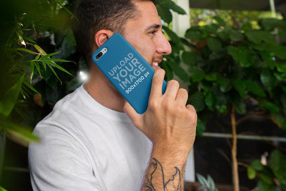 Mockup of a Phone Case Held Up to a Man's Ear