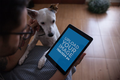 iPad Mockup Featuring a Man Petting His Dog at Home 22834