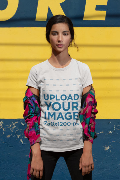 Mockup of a Woman Wearing a T-Shirt and a Printed Shirt