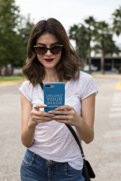 Mockup of a Phone Case and a Woman Wearing Trendy Sunglasses