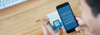 Mockup of a Young Man Scanning a QR Code with an iPhone 6 a4084