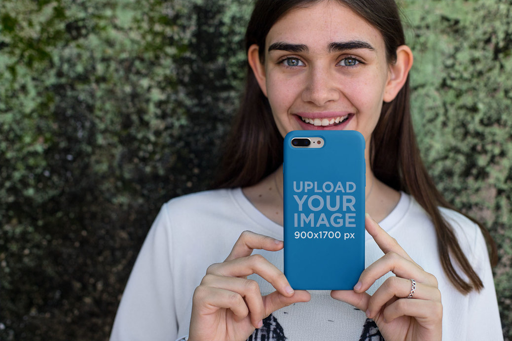 Mockup Featuring a Pretty Woman Showing an iPhone Case