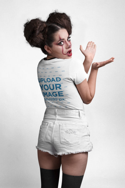 Back View T-Shirt Mockup of a Girl with Spooky Halloween Makeup at a Photo Studio 22917